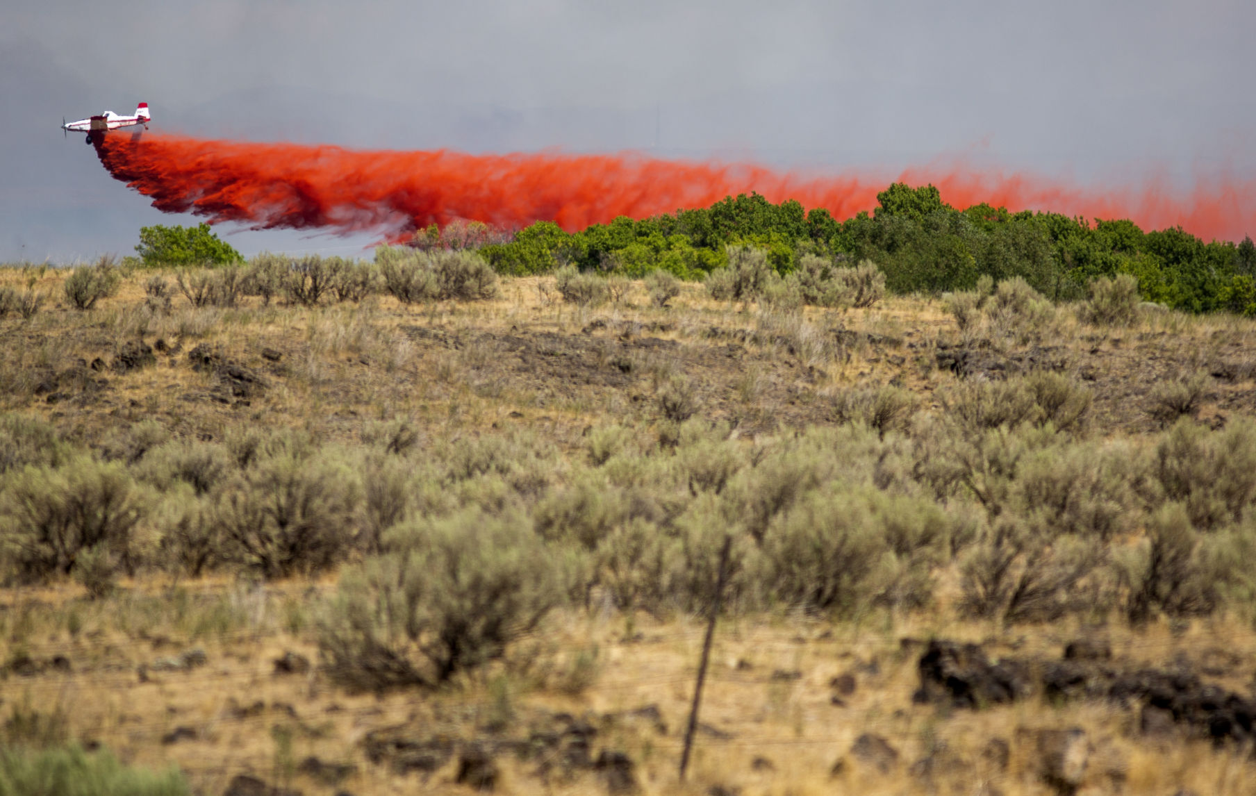 Drops Fire spreads more than 2,000 acres